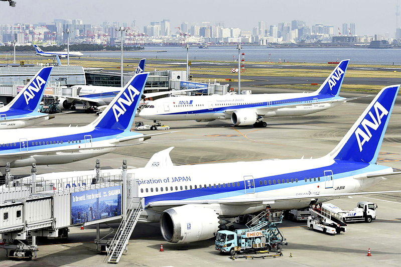 东京羽田机场2架飞机 险酿空中相撞