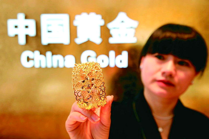 人行连续21个月增持黄金 传将更多黄金存放香港